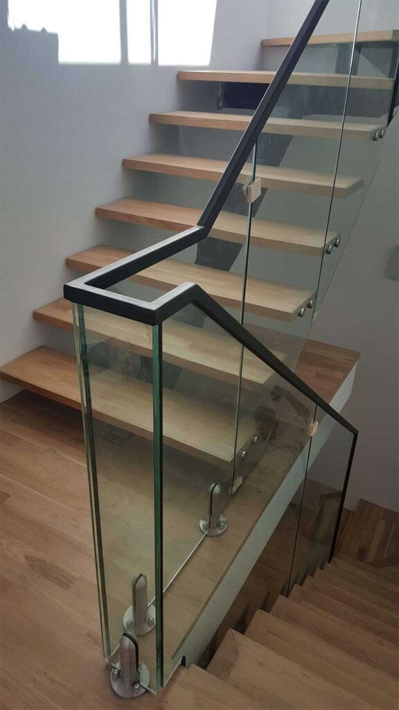Staircase glass railing | Glass Contractor Singapore | Table Tempered Glass Top. Shopfront Aluminium Works.
